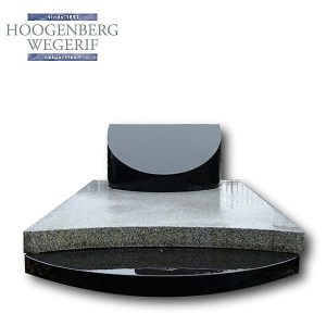 Bijzonder grafmonument met massieve zwart en wit graniet platen