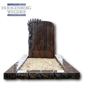 Grafsteen met gebeeldhouwde korenaar in Halmstadt graniet