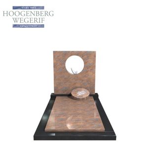 Rood graniet grafmonument met uitgezaagde cirkel