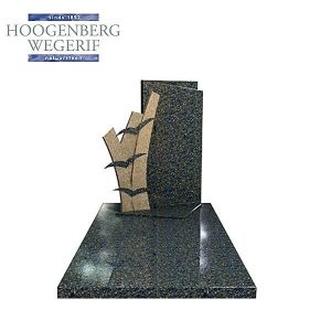 Blauw graniet grafmonument met uitgesneden vogels