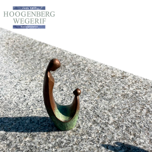 Brons moeder met kind